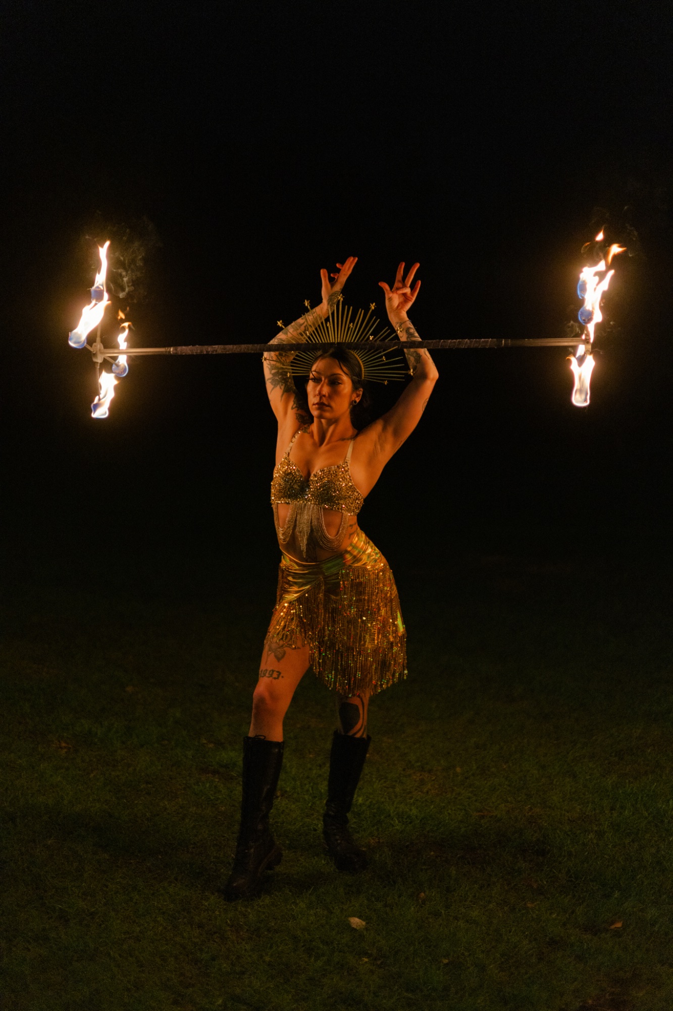 Fire dancer with staff